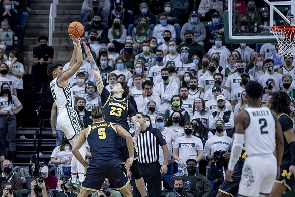 Terrance Williams II (5) and Brandon Johns Jr. (23)