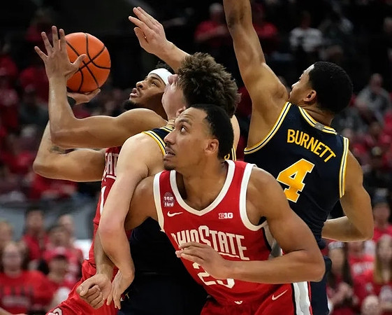 Will Tschetter (42) and Nimari Burnett (4)