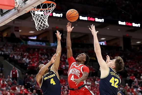 Nimari Burnett (4) and Will Tschetter (42)