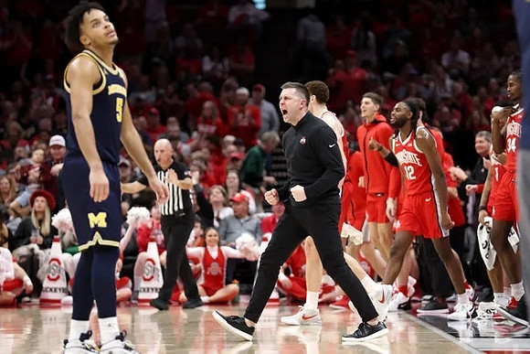 Terrance Williams II (5) and Ohio State Interim Head Coach Jake Diebler