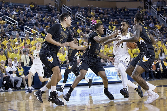 Duncan Robinson (22) and Charles Matthews (1)
