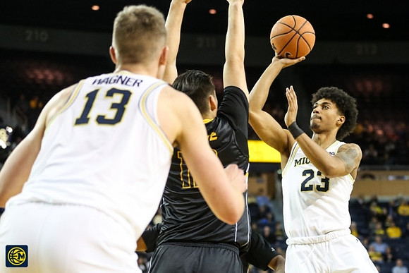 Moritz Wagner (13) and Ibi Watson (23)