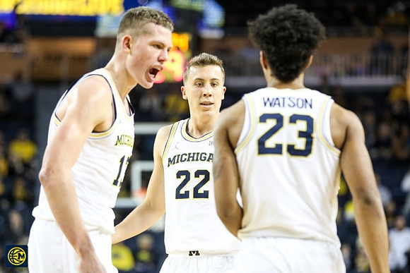 Moritz Wagner (13), Duncan Robinson (22), and Ibi Watson (23)