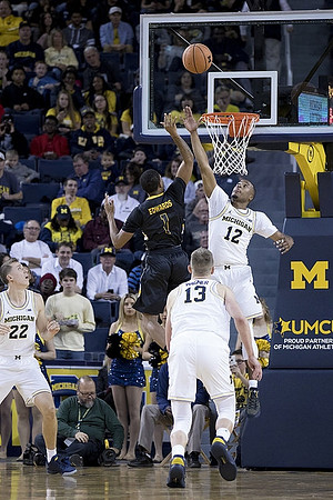 Duncan Robinson (22), Moritz Wagner (13), and Muhammad-Ali Abdur-Rahkman (12)
