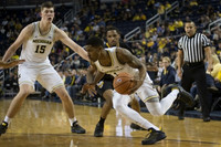 Jon Teske (15) and Charles Matthews (1)