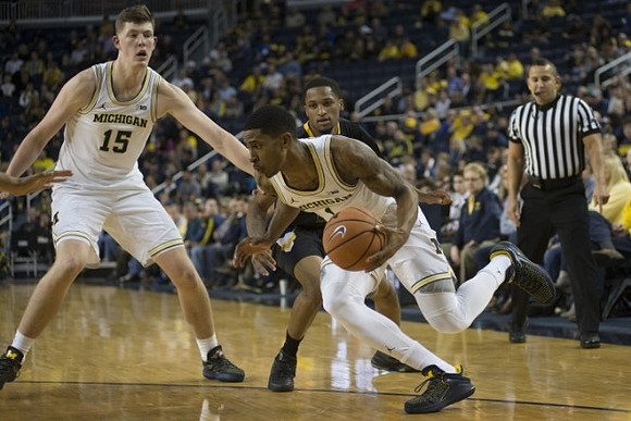 Jon Teske (15) and Charles Matthews (1)