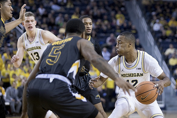 Moritz Wagner (13) and Muhammad-Ali Abdur-Rahkman (12)