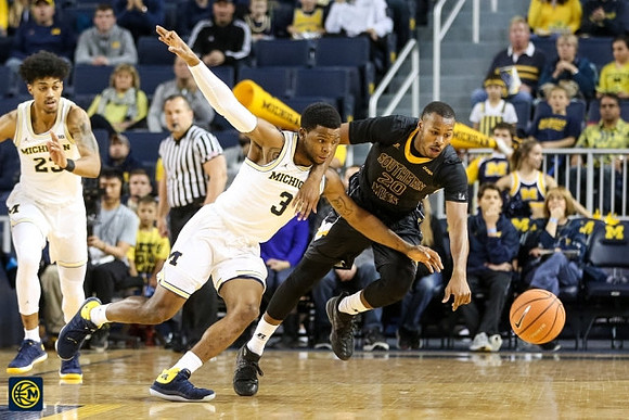 Ibi Watson (23) and Zavier Simpson (3)