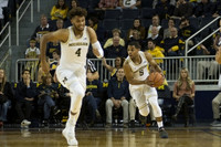 Isaiah Livers (4) and Jaaron Simmons (5)