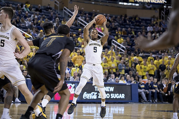 Jon Teske (15) and Jaaron Simmons (5)