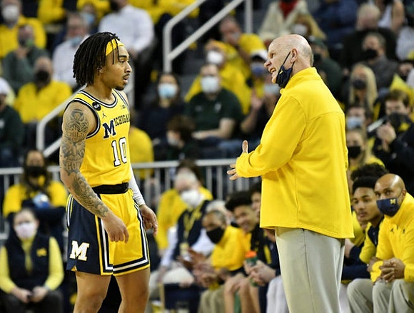 Frankie Collins (10) and Phil Martelli