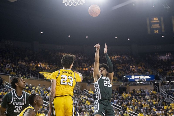 Moussa Diabate (14) and Brandon Johns Jr. (23)