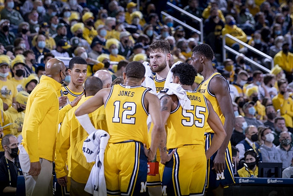 Saddi Washington, Phil Martelli, Caleb Houstan (22), DeVante' Jones (12), Hunter Dickinson (1), Eli Brooks (55), and Moussa Diabate (14)