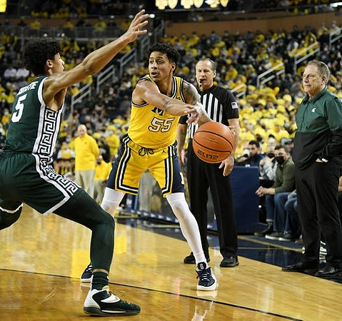Eli Brooks (55) and Michigan State Head Coach Tom Izzo