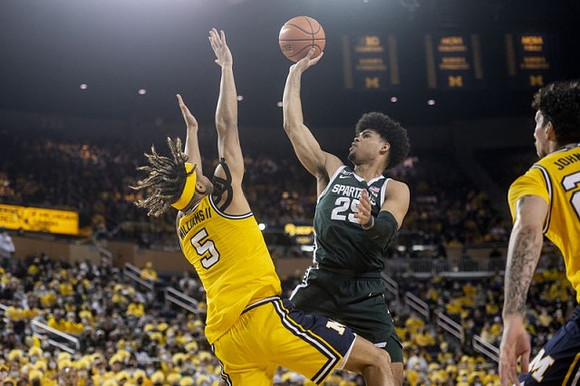 Terrance Williams II (5) and Brandon Johns Jr. (23)