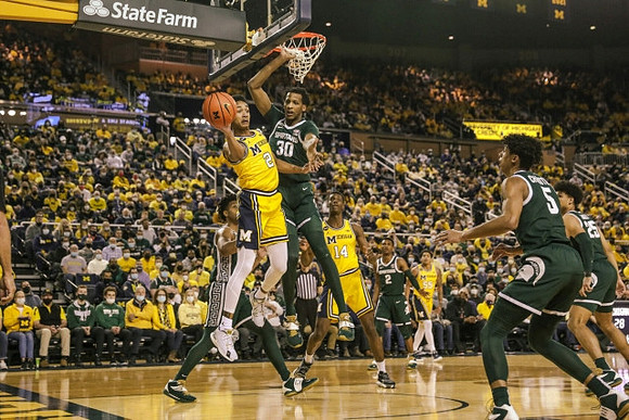 Kobe Bufkin (2), Moussa Diabate (14), and Eli Brooks (55)