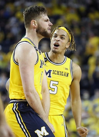 Hunter Dickinson (1) and Terrance Williams II (5)