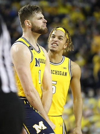 Hunter Dickinson (1) and Terrance Williams II (5)