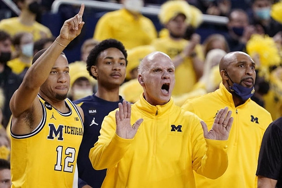 DeVante' Jones (12), Kobe Bufkin (2), Phil Martelli, and Saddi Washington