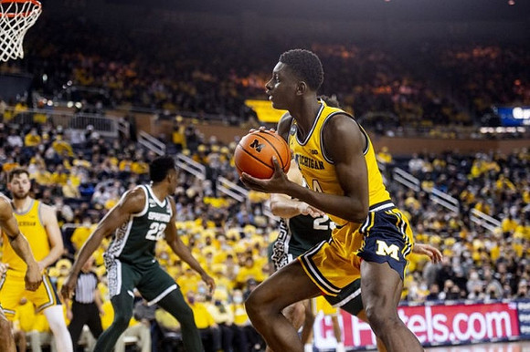 Moussa Diabate (14) and Hunter Dickinson (1)