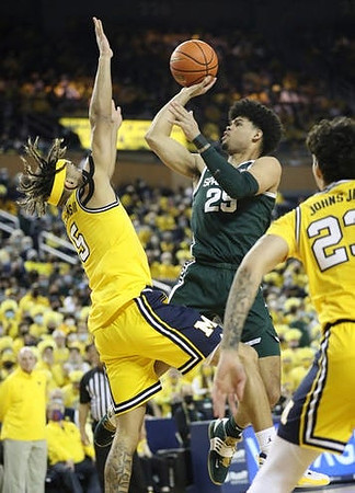 Terrance Williams II (5) and Brandon Johns Jr. (23)