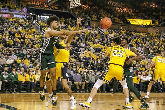 Terrance Williams II (5), Brandon Johns Jr. (23), and Caleb Houstan (22)