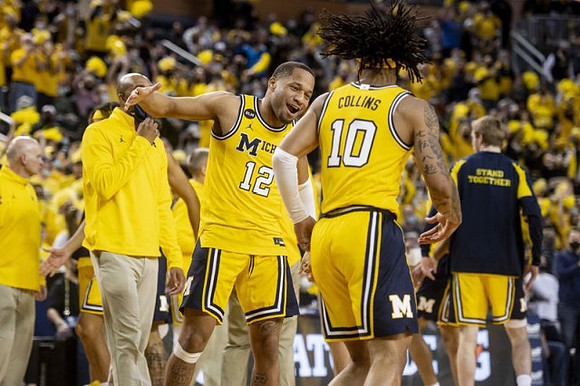 DeVante' Jones (12) and Frankie Collins (10)