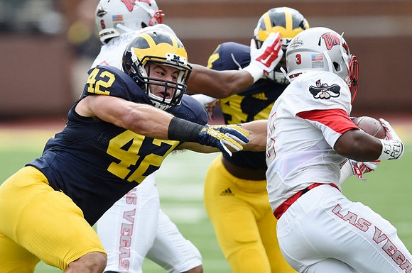 Ben Gedeon (42) and Delano Hill (44)