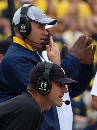 Jim Harbaugh and D.J. Durkin