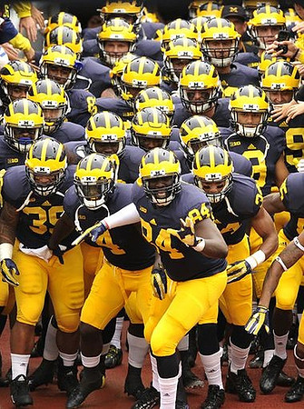 A.J. Williams (84) and Michigan Team