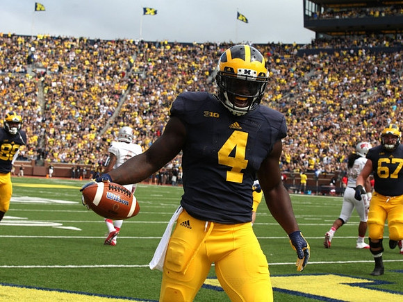 De'Veon Smith (4) and Kyle Kalis (67)