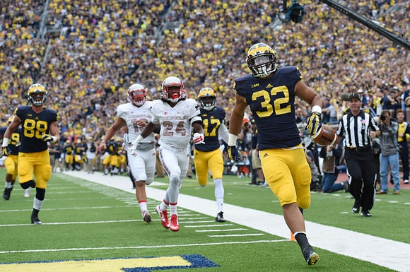 Ty Isaac (32), Jake Butt (88), and Freddy Canteen (17)