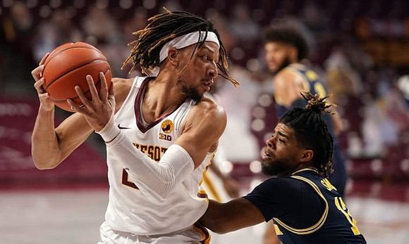 Mike Smith (12) and Isaiah Livers (2)