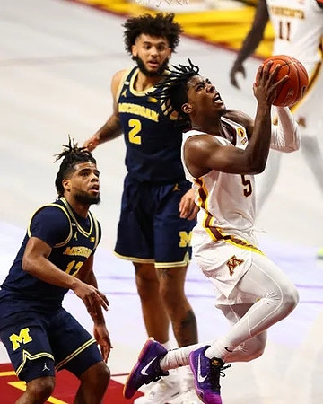 Mike Smith (12) and Isaiah Livers (2)