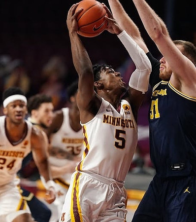 Austin Davis (51) and Brandon Johns Jr. (23)