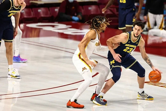 Austin Davis (51) and Brandon Johns Jr. (23)
