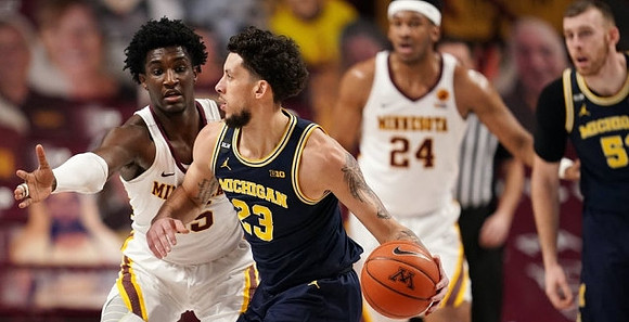 Brandon Johns Jr. (23) and Austin Davis (51)