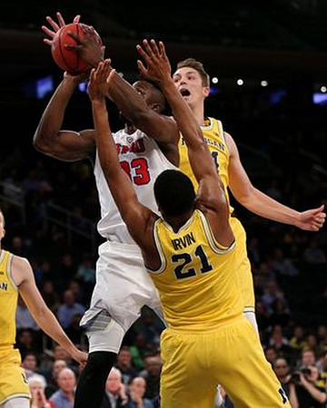 Zak Irvin (21) and Mark Donnal (34)