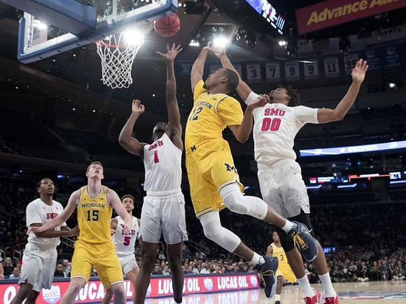 Jon Teske (15) and Muhammad-Ali Abdur-Rahkman (12)