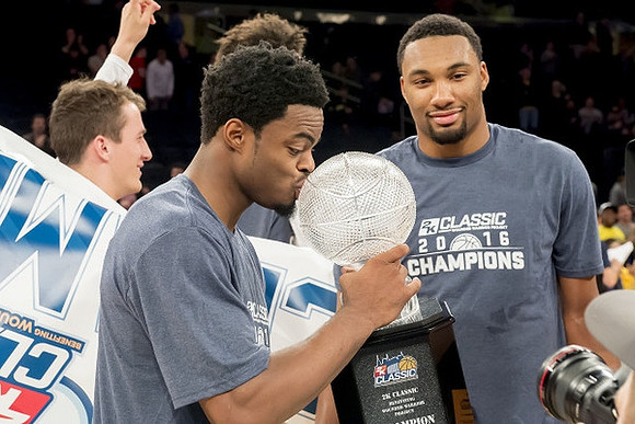 Derrick Walton Jr. (10) and Zak Irvin (21)