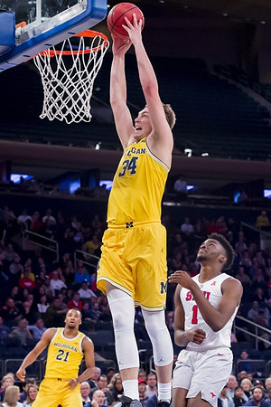 Zak Irvin (21) and Mark Donnal (34)