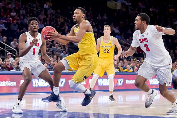 Zak Irvin (21) and Duncan Robinson (22)