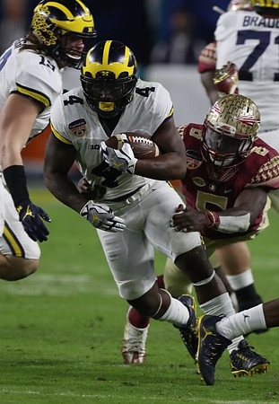 De'Veon Smith (4), Henry Poggi (19), and Ben Braden (71)