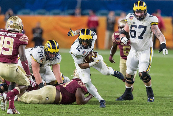 Ben Bredeson (74), Chris Evans (12), and Kyle Kalis (67)