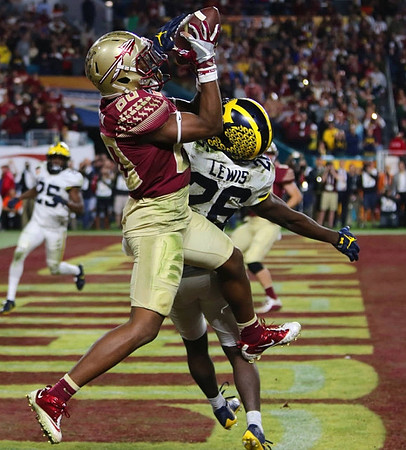 Dymonte Thomas (25) and Jourdan Lewis (26)