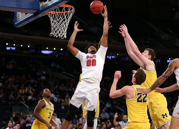 Xavier Simpson (3), Duncan Robinson (22), and Jon Teske (15)