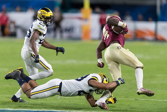 Dymonte Thomas (25) and Tyree Kinnel (23)