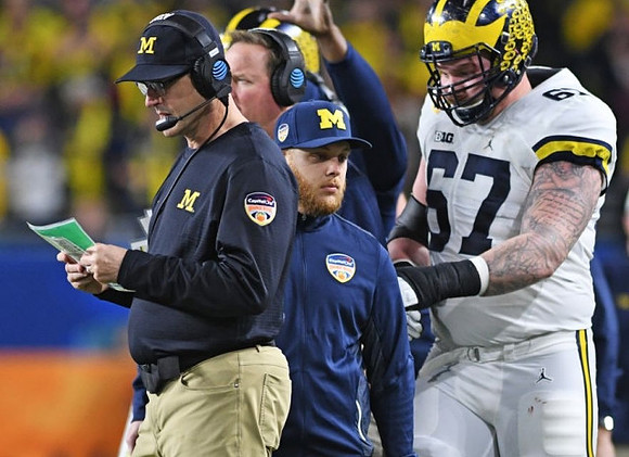 Jim Harbaugh, Tim Drevno, and Kyle Kalis (67)
