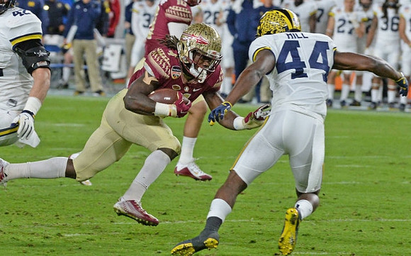 Ben Gedeon (42) and Delano Hill (44)