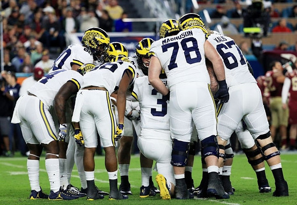 Khalid Hill (80), De'Veon Smith (4), Jehu Chesson (86), Wilton Speight (3), Erik Magnuson (78), and Kyle Kalis (67)